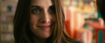 Movie still from “How to Be Single” (2016), directed by Christian Ditter – A woman's face with blue eyes; Close Up shot, Over the shoulder angle