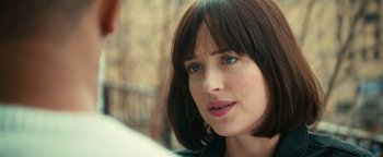 Movie still from “How to Be Single” (2016), directed by Christian Ditter – A person wearing a jacket; Close Up shot, Over the shoulder angle