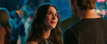 Movie still from “How to Be Single” (2016), directed by Christian Ditter – A person looking up at something; Close Up shot, Over the shoulder angle