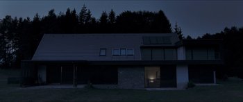 Movie still from “Goodnight Mommy” (2014), directed by Severin Fiala – A house that has a lot of windows in it; Extreme Wide shot, Low angle