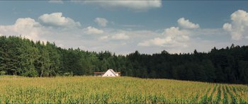 Movie still from “Goodnight Mommy” (2014), directed by Severin Fiala – A house sitting in the middle of a corn field; Extreme Wide shot, High angle
