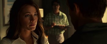 Movie still from “Green Lantern” (2011), directed by Martin Campbell – A woman is looking at a man in a green shirt; Close Up shot, Over the shoulder angle