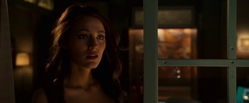 Movie still from “Green Lantern” (2011), directed by Martin Campbell – A beautiful young lady looking out of a window; Close Up shot, Over the shoulder angle