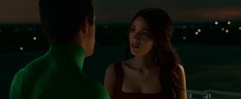 Movie still from “Green Lantern” (2011), directed by Martin Campbell – A man and a woman talking in the dark; Close Up shot, Over the shoulder angle