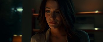 Movie still from “Green Lantern” (2011), directed by Martin Campbell – A person wearing a white shirt; Close Up shot, Low angle