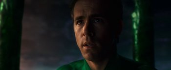Movie still from “Green Lantern” (2011), directed by Martin Campbell – A person wearing a green shirt; Close Up shot, Over the shoulder angle