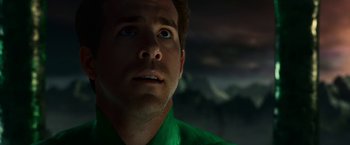 Movie still from “Green Lantern” (2011), directed by Martin Campbell – A person wearing a green shirt; Close Up shot, Over the shoulder angle