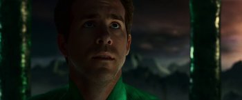 Movie still from “Green Lantern” (2011), directed by Martin Campbell – A person wearing a green shirt; Close Up shot, Over the shoulder angle