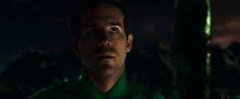 Movie still from “Green Lantern” (2011), directed by Martin Campbell – A person wearing a green shirt; Close Up shot, Over the shoulder angle