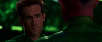 Movie still from “Green Lantern” (2011), directed by Martin Campbell – A person looking at the camera; Close Up shot, Over the shoulder angle
