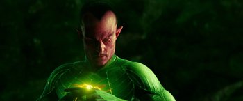 Movie still from “Green Lantern” (2011), directed by Martin Campbell – A person wearing a green costume; Medium shot, Over the shoulder angle