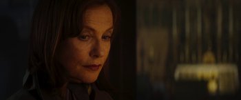 Movie still from “Greta” (2018), directed by Neil Jordan – A person looking at the camera; Close Up shot, Low angle