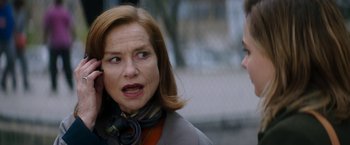 Movie still from “Greta” (2018), directed by Neil Jordan – A person talking to another person; Close Up shot, Over the shoulder angle