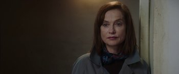 Movie still from “Greta” (2018), directed by Neil Jordan – A person wearing a jacket; Close Up shot, Low angle