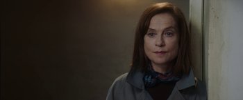 Movie still from “Greta” (2018), directed by Neil Jordan – A person wearing a jacket; Close Up shot, Low angle