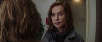 Movie still from “Greta” (2018), directed by Neil Jordan – A person wearing a jacket; Close Up shot, Over the shoulder angle