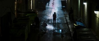 Movie still from “Greta” (2018), directed by Neil Jordan – A person standing in the middle of a street; Extreme Wide shot, High angle