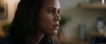 Movie still from “Greta” (2018), directed by Neil Jordan – A person looking to the side; Close Up shot, Over the shoulder angle