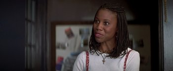 Movie still from “I Know What You Did Last Summer” (1997), directed by Jim Gillespie – A person wearing a necklace; Close Up shot, Over the shoulder angle
