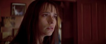 Movie still from “I Know What You Did Last Summer” (1997), directed by Jim Gillespie – A person with long brown hair; Close Up shot, Low angle