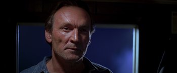 Movie still from “I Know What You Did Last Summer” (1997), directed by Jim Gillespie – A person wearing a black shirt; Close Up shot, Low angle