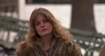Movie still from “Hair” (1979), directed by Milos Forman – A person wearing a fur coat; Close Up shot, Low angle