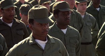 Movie still from “Hair” (1979), directed by Milos Forman – A group of people wearing hats; Close Up shot, Low angle