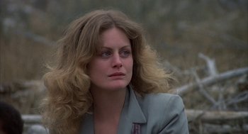 Movie still from “Hair” (1979), directed by Milos Forman – A person wearing a jacket; Close Up shot, Low angle
