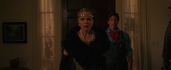 Movie still from “Halloween Ends” (2022), directed by David Gordon Green – A man and a woman dressed up in costume for halloween; Medium shot, Low angle