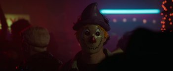 Movie still from “Halloween Ends” (2022), directed by David Gordon Green – A creepy scarecrow mask; Close Up shot, Low angle
