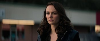 Movie still from “Halloween Ends” (2022), directed by David Gordon Green – A person with long hair; Close Up shot, Over the shoulder angle