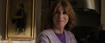 Movie still from “Halloween Ends” (2022), directed by David Gordon Green – A person wearing a purple shirt; Close Up shot, Over the shoulder angle