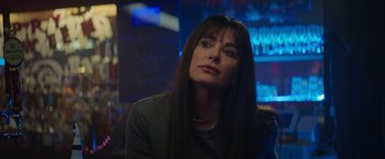 Movie still from “Halloween Ends” (2022), directed by David Gordon Green – A person sitting in a room; Close Up shot, Over the shoulder angle