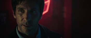 Movie still from “Halloween Ends” (2022), directed by David Gordon Green – A person in a dark room; Close Up shot, Low angle