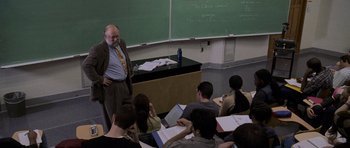 Movie still from “Halloween: Resurrection” (2002), directed by Rick Rosenthal – An older man standing in front of a group of students; Medium shot, High angle