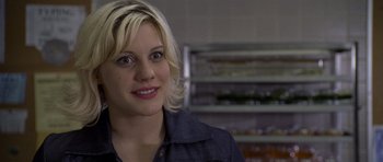 Movie still from “Halloween: Resurrection” (2002), directed by Rick Rosenthal – A person with blonde hair; Close Up shot, Over the shoulder angle