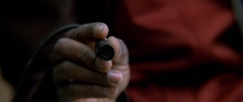 Movie still from “Halloween: Resurrection” (2002), directed by Rick Rosenthal – A person holding a video camera in their hands; Extreme Close Up shot, High angle