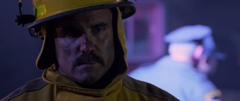 Movie still from “Halloween: Resurrection” (2002), directed by Rick Rosenthal – A person wearing a yellow jacket; Close Up shot, Low angle