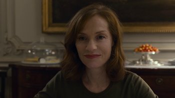 Movie still from “Happy End” (2017), directed by Michael Haneke – A person sitting in a room; Close Up shot, Over the shoulder angle