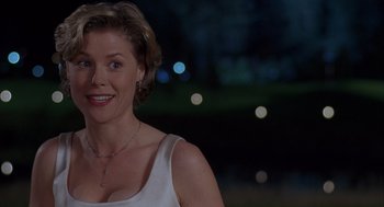 Movie still from “Happy Gilmore” (1996), directed by Dennis Dugan – A person wearing a white shirt; Close Up shot, Over the shoulder angle
