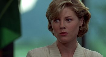 Movie still from “Happy Gilmore” (1996), directed by Dennis Dugan – A person with short hair; Close Up shot, Over the shoulder angle