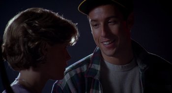 Movie still from “Happy Gilmore” (1996), directed by Dennis Dugan – A man and a woman talking to each other; Close Up shot, Over the shoulder angle