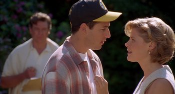 Movie still from “Happy Gilmore” (1996), directed by Dennis Dugan – A man and a woman talking to each other; Close Up shot, Over the shoulder angle