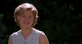 Movie still from “Happy Gilmore” (1996), directed by Dennis Dugan – A person wearing a white shirt; Close Up shot, Over the shoulder angle