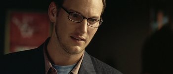 Movie still from “Hard Candy” (2005), directed by David Slade – A person wearing glasses; Close Up shot, Over the shoulder angle
