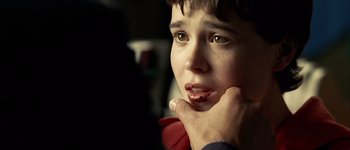 Movie still from “Hard Candy” (2005), directed by David Slade – A person with his hand on his chin; Close Up shot, Over the shoulder angle