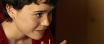 Movie still from “Hard Candy” (2005), directed by David Slade – A young person's face; Extreme Close Up shot, Over the shoulder angle