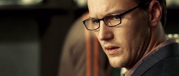 Movie still from “Hard Candy” (2005), directed by David Slade – A person wearing glasses; Close Up shot, Low angle