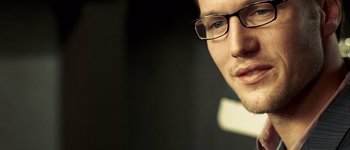 Movie still from “Hard Candy” (2005), directed by David Slade – A person wearing glasses; Extreme Close Up shot, High angle