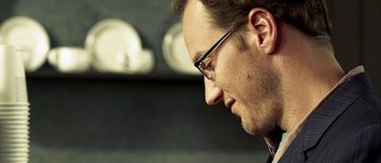 Movie still from “Hard Candy” (2005), directed by David Slade – A person wearing glasses; Close Up shot, Over the shoulder angle